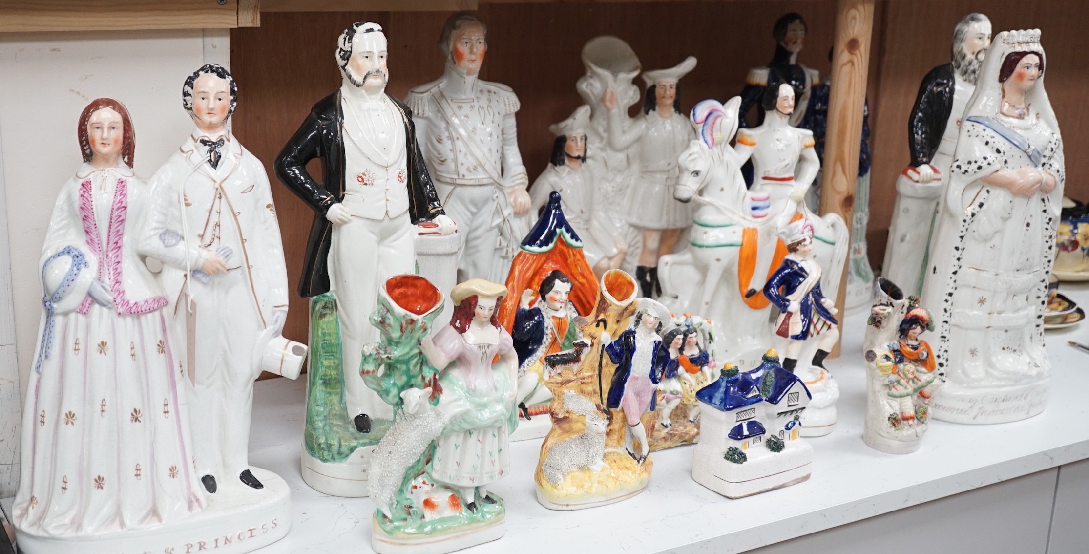 A collection of mostly 19th century Staffordshire flatbacks, including Princess Royal and