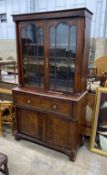 A Regency mahogany secretaire bookcase, width 121cm, depth 52cm, height 223cm Ivory submission