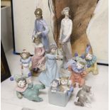 Nine Lladro and Nao figural and animal models, tallest 30cms high