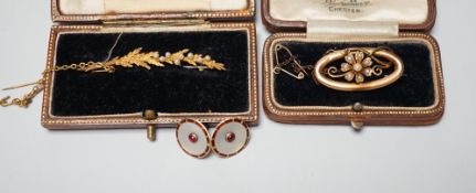 An early 20th century 15ct and seed pearl set leaf brooch, 51mm, one other 15ct and seed pearl