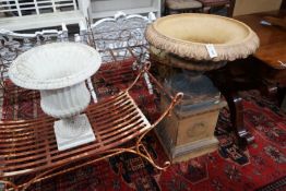 A Victorian earthenware campana garden urn on a plinth base, diameter 64cm, height 90cm