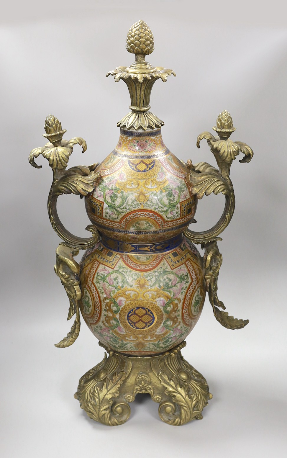 A large Louis XV-style ormolu-mounted ceramic urn. 69.5cm high