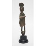 A bronze figure, Nuragic culture or later, from Sardinia, 18cm