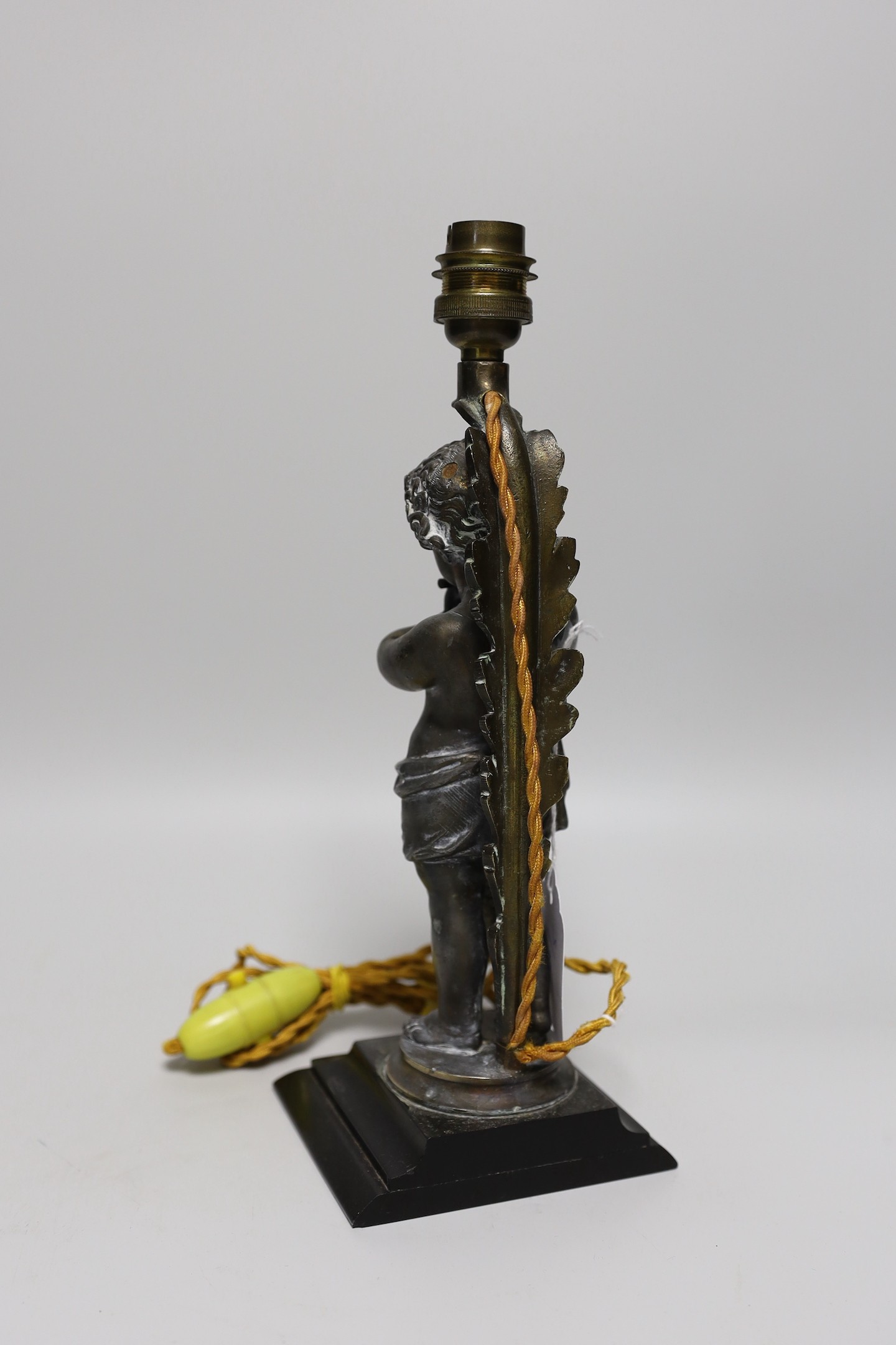 A metal musical putti lamp base, 30cms high - Image 2 of 2