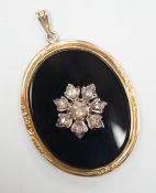 A Victorian yellow metal mounted, rose cut diamond set black onyx oval pendant, overall 56mm,