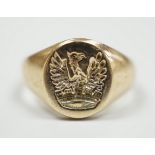 A yellow metal crested signet ring, carved with eagle above coronet, size G, gross weight 3.8