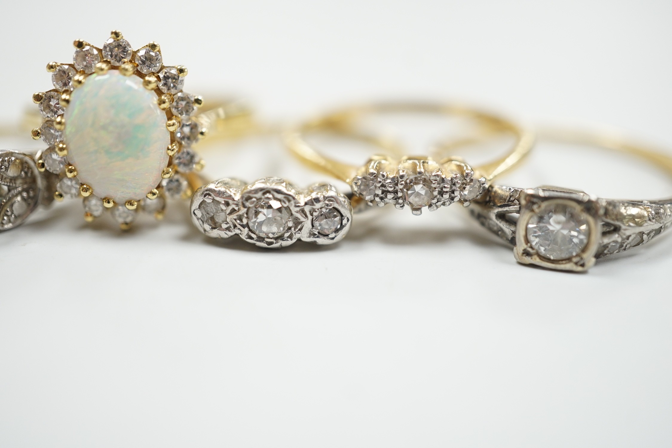 Four assorted 18ct and gem set dress rings, including white opal and diamond and two three stone - Image 3 of 5
