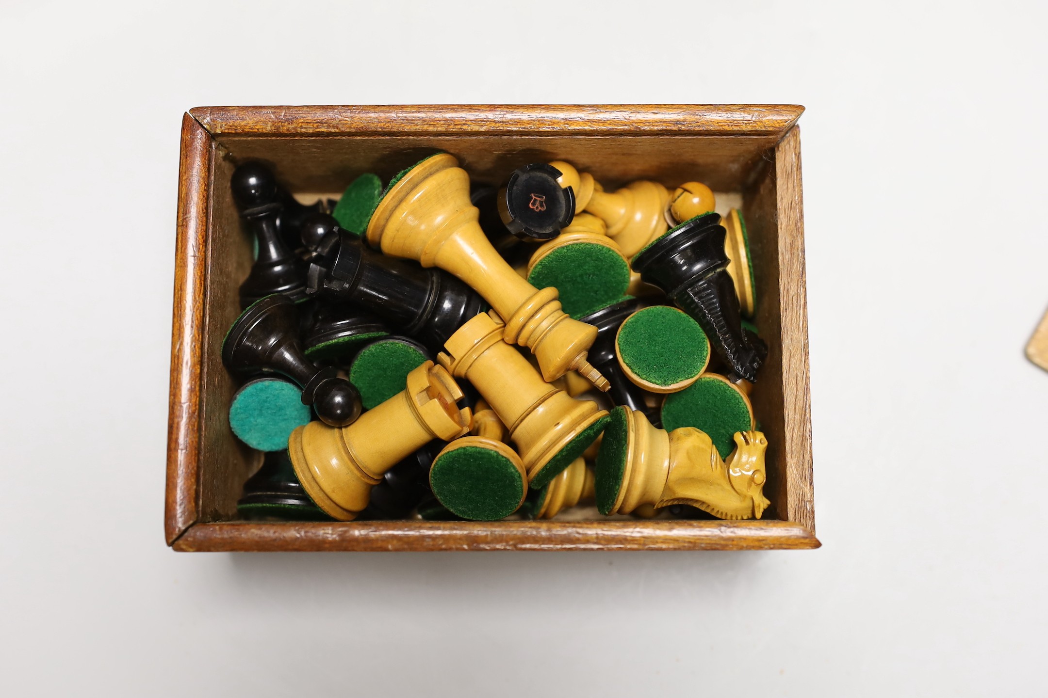 A Staunton pattern boxwood and ebony chess set, kings 7.5cm high and a boxed games compendium - Image 2 of 4