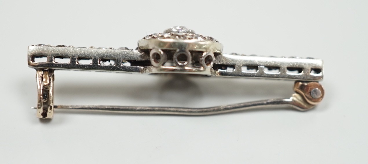 An early 20th century 9ct white metal diamond target cluster set bar brooch, 30mm, gross weight 2. - Image 3 of 3