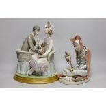 A large Lladro figure group of a couple and their dog on base together with a Lladro figure of a