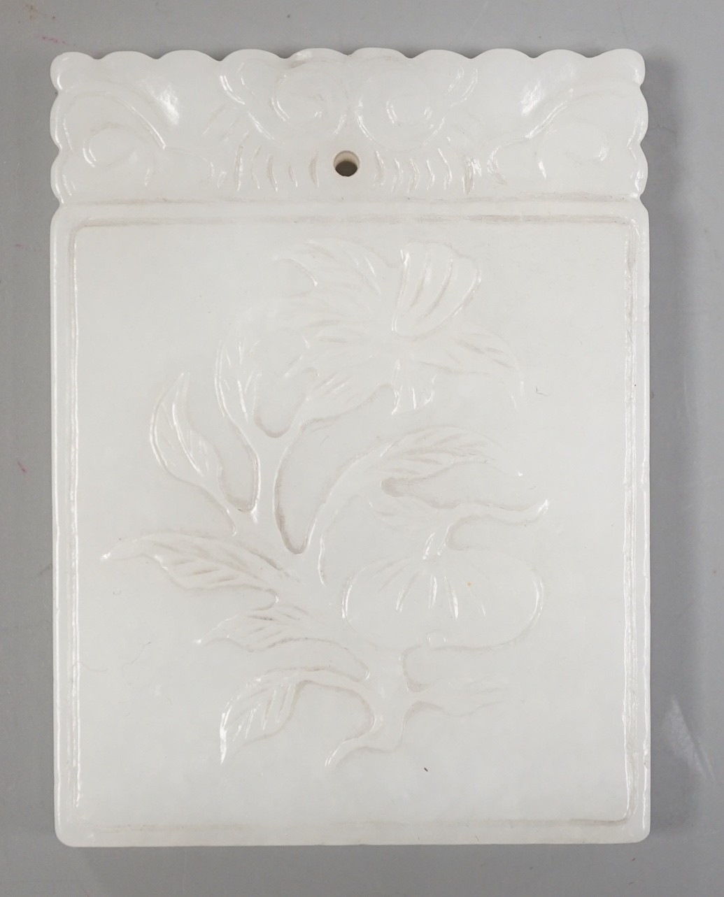 A Chinese white jade plaque 5 x 4cm