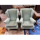 A pair of George III style wing armchairs, width 78cm, depth 66cm, height 99cm