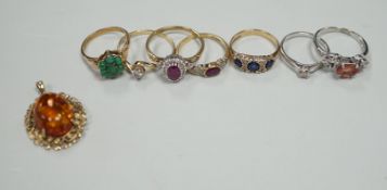 Seven assorted modern 9ct gold and gem set rings, including two solitaire diamond rings, together