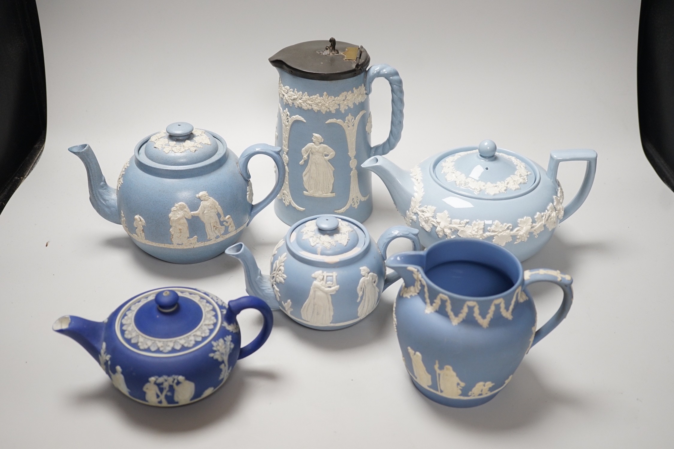 A group of Wedgwood and Wedgwood style jasperware teapots and jugs. - Image 2 of 9