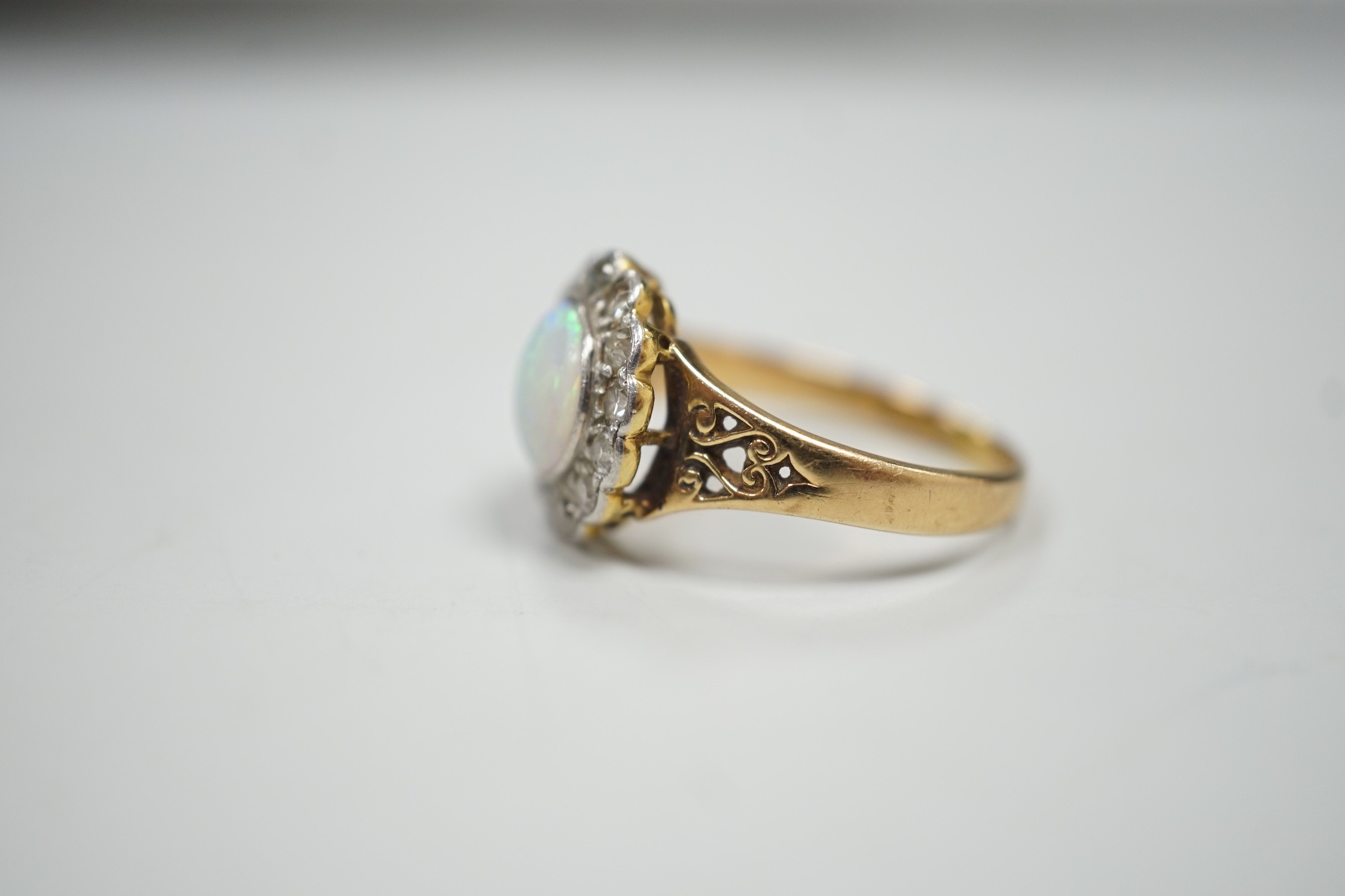 A 1920's? yellow metal, white opal and round cut diamond set circular cluster ring, size O, gross - Image 2 of 4