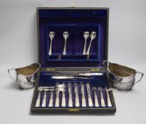 Six pairs of silver plated and engraved dessert knives and forks, with server, mother of pearl