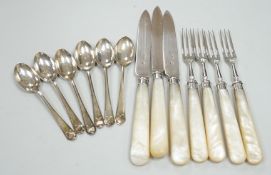 A set of six George V golfing related teaspoons, Walker & Hall, Sheffield, 1933 and seven mother