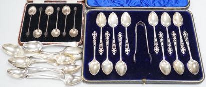 A cased set of twelve George V pierced silver teaspoons, with tongs, Sheffield, 1910, one other