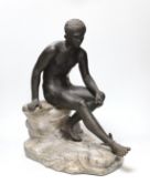 After the Antique, a late 19th century bronze figure of Mercury, seated on a grey marble