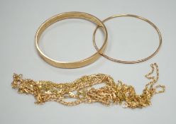 Two 9ct gold bangles and four modern 9ct gold chains, one a.f. gross 42.8 grams.