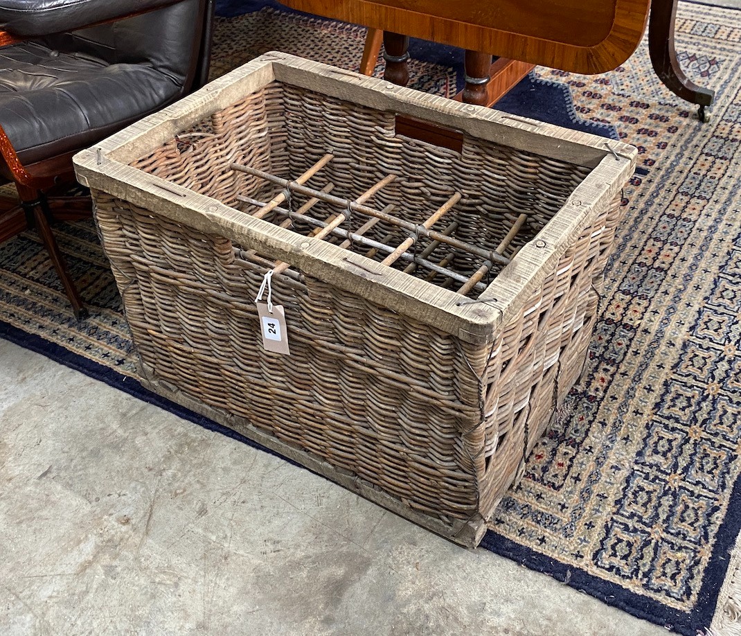 A vintage French 12 bottle wicker crate, width 58cm, depth 38cm, height 40cm