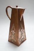 A hammered copper Art Nouveau coffee pot, 29cms high