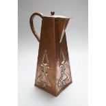 A hammered copper Art Nouveau coffee pot, 29cms high