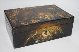 A Victorian painted papier-mâché sewing box, with peacock, blossom and gilt decoration with wooden