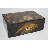 A Victorian painted papier-mâché sewing box, with peacock, blossom and gilt decoration with wooden