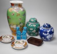 Two Chinese ginger jars, a pair of turquoise lion dogs, a Japanese vase and two similar saucers.