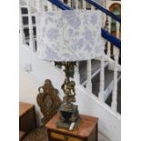 A large cherub stem cast brass five light table lamp with shade, 99cms high including shade