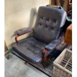 A mid century Scandinavian black leather swivel chair, width 77cm, depth 70cm, height 90cm