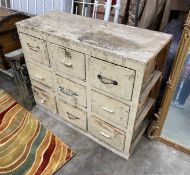 A small Victorian painted pine nine drawer chest, width 112cm, depth 45cm, height 92cm