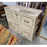 A small Victorian painted pine nine drawer chest, width 112cm, depth 45cm, height 92cm