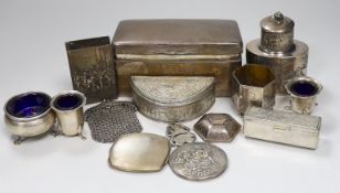 A George V silver mounted cigarette box, 16.9cm and a group of assorted white metal items.