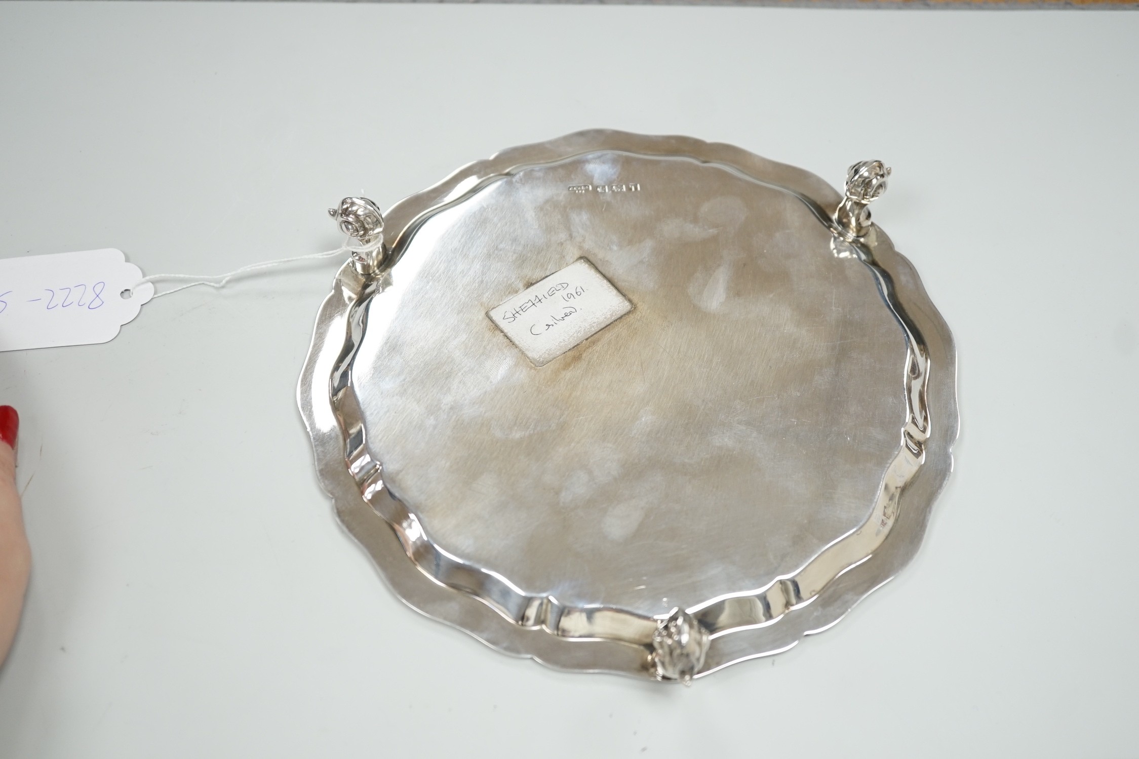 An Elizabeth II silver salver, on three scroll feet, A. Chick & Sons, Sheffield, 1961, diameter 20. - Image 2 of 3