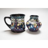A boxed Moorcroft ‘Dragonfly’ mug and a similar vase, mug 8.5cms high