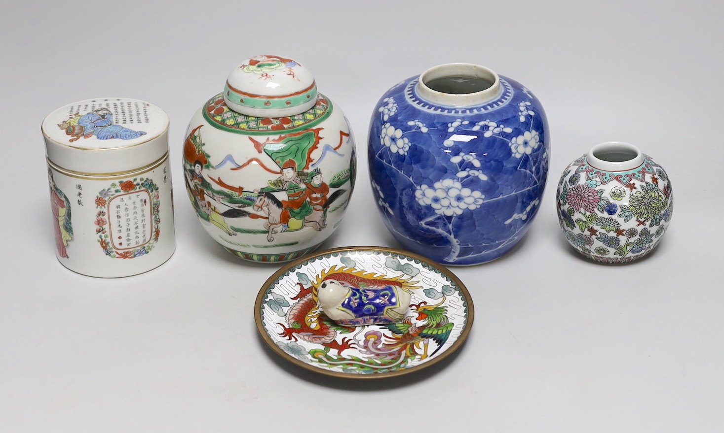 A 19th century Chinese famille rose box and cover, a blue and white prunus jar, two other jars, a