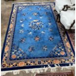 A Chinese blue ground carpet, 300 x 200cm