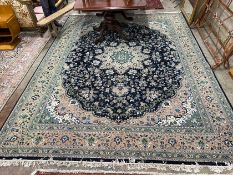 A North West Persian blue floral ground carpet, 400 x 302cm