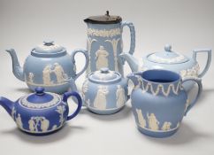 A group of Wedgwood and Wedgwood style jasperware teapots and jugs.