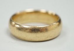 A 14k wedding band, stamped 'Columbia' and inscribed 'All my love Nancy', size U, 11.6 grams.