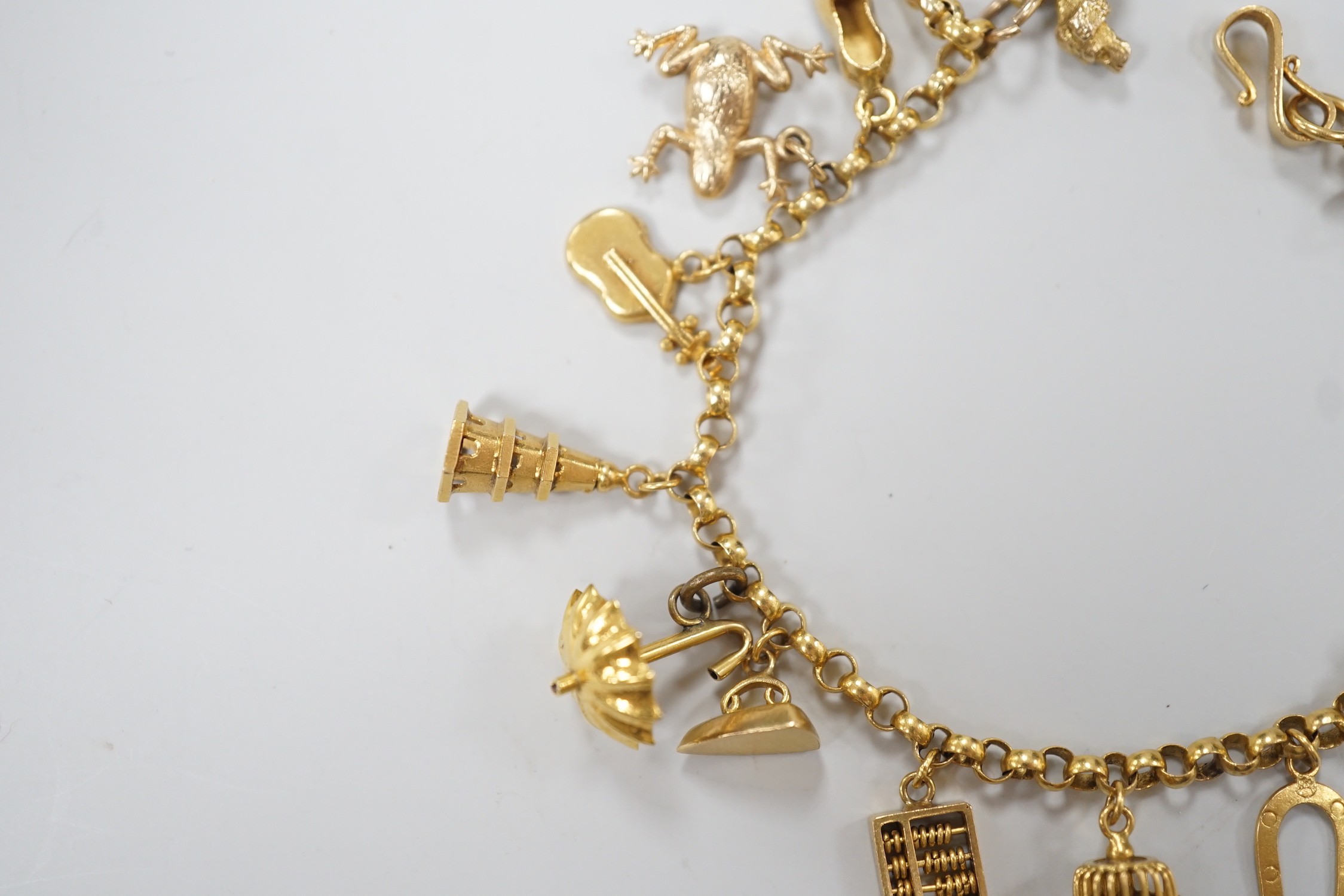 A Chinese yellow metal charm bracelet, hung with thirteen assorted yellow metal charms including - Image 4 of 5