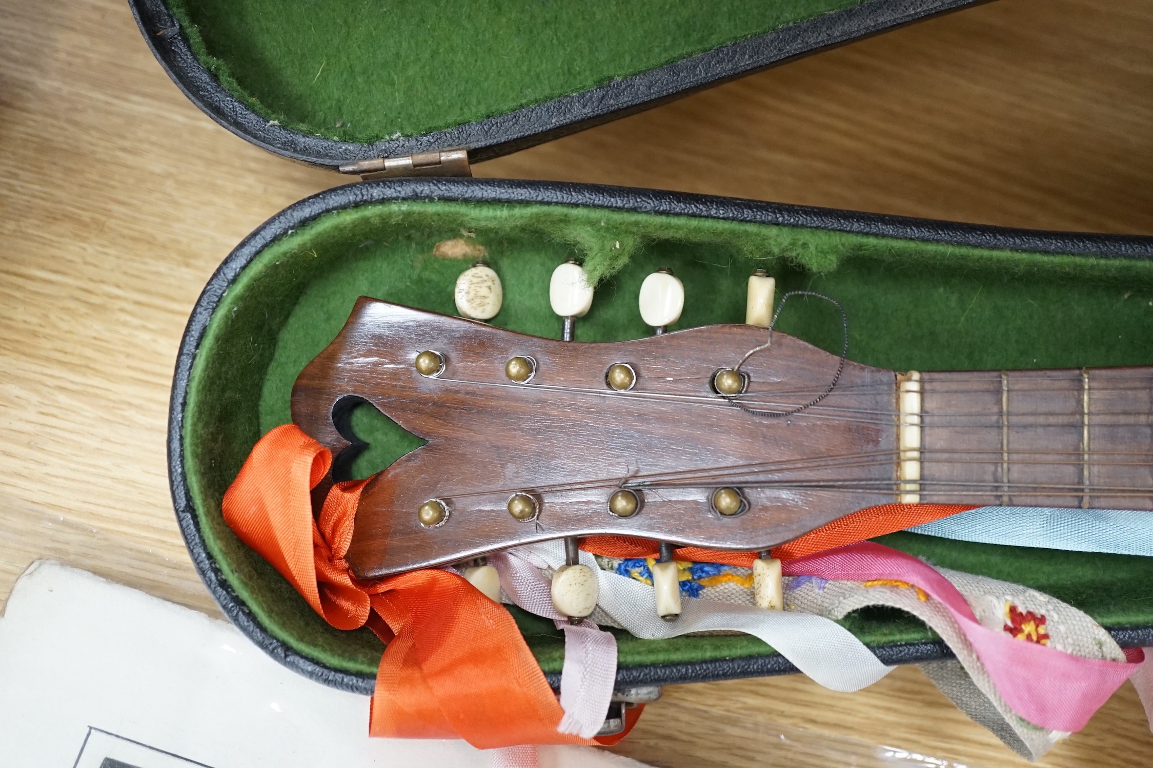 A cased late 19th/early 20th century Italian lute back mandolin with segmented rosewood back and - Image 2 of 4