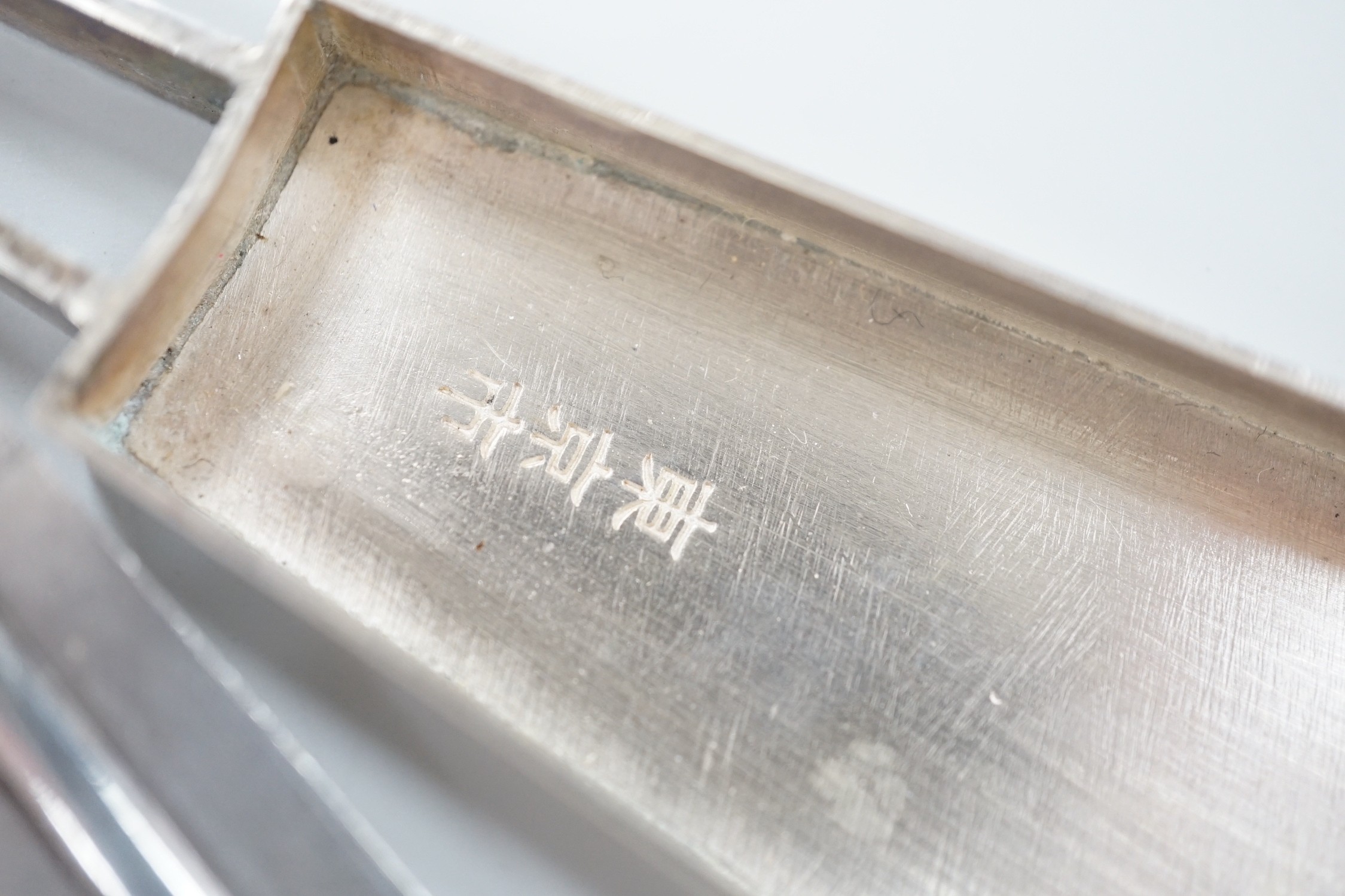 A 20th century Japanese white metal pill box, modelled as a fan with sliding panel, signed, 11.4cm. - Image 5 of 5