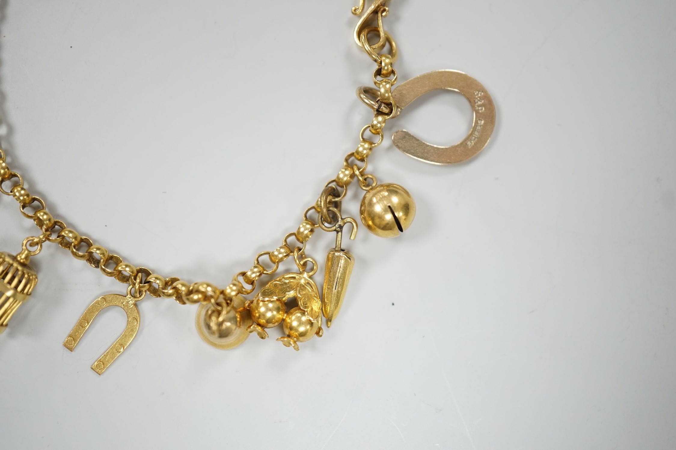A Chinese yellow metal charm bracelet, hung with thirteen assorted yellow metal charms including - Image 2 of 5