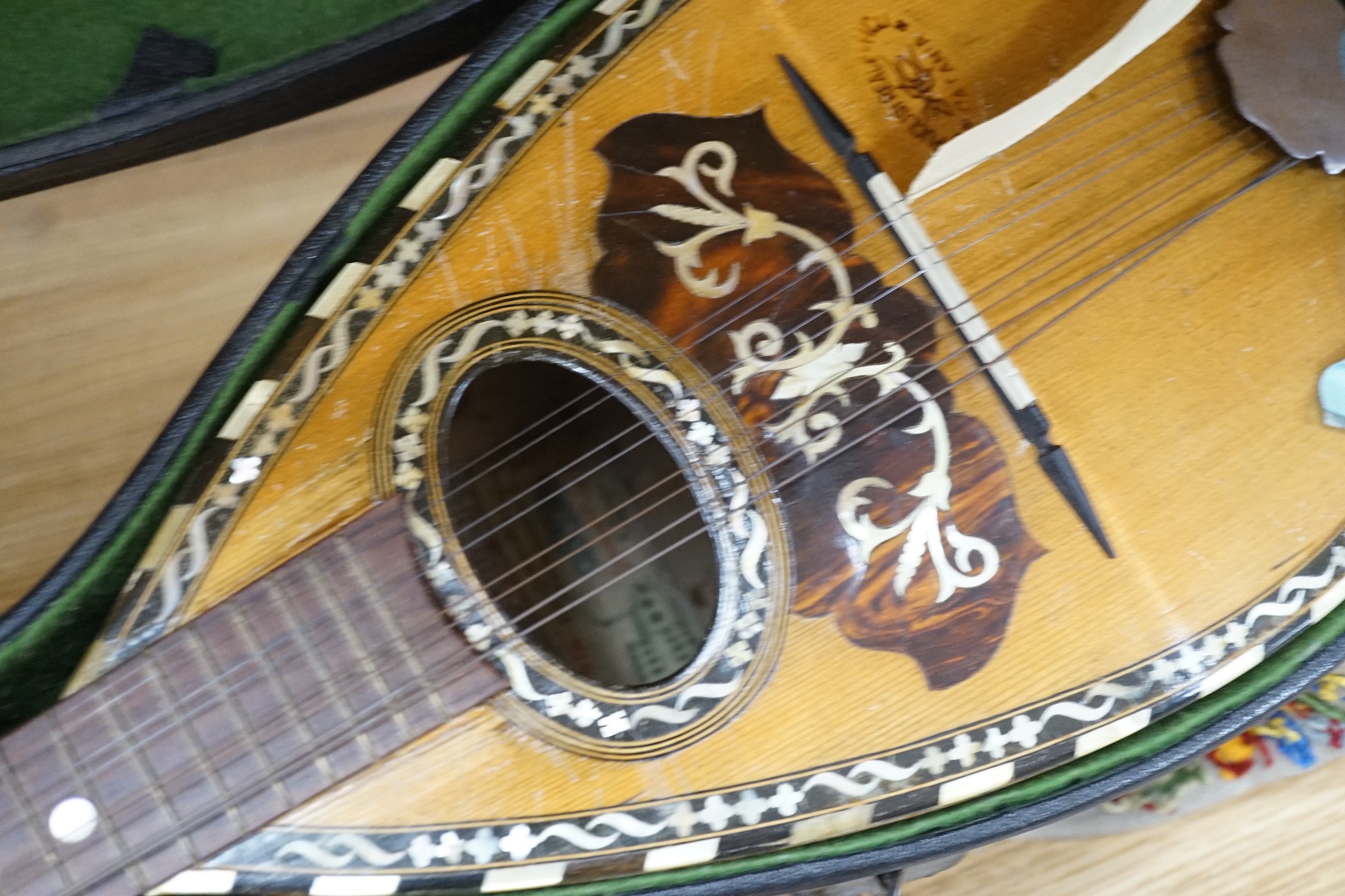 A cased late 19th/early 20th century Italian lute back mandolin with segmented rosewood back and - Image 3 of 4