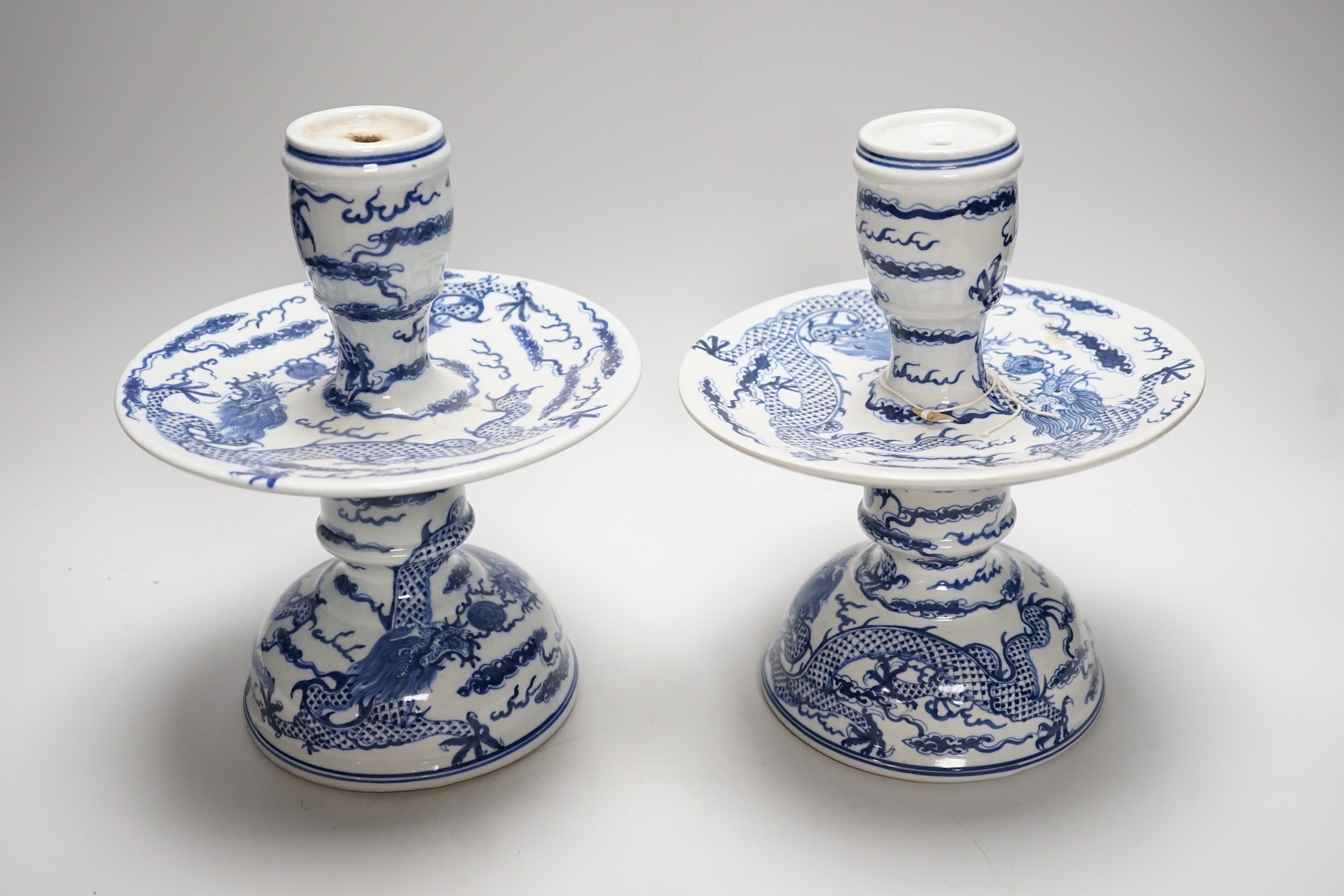 Two Chinese blue and white candlesticks and a turquoise glaze dragon vase, 30cms high - Image 6 of 9
