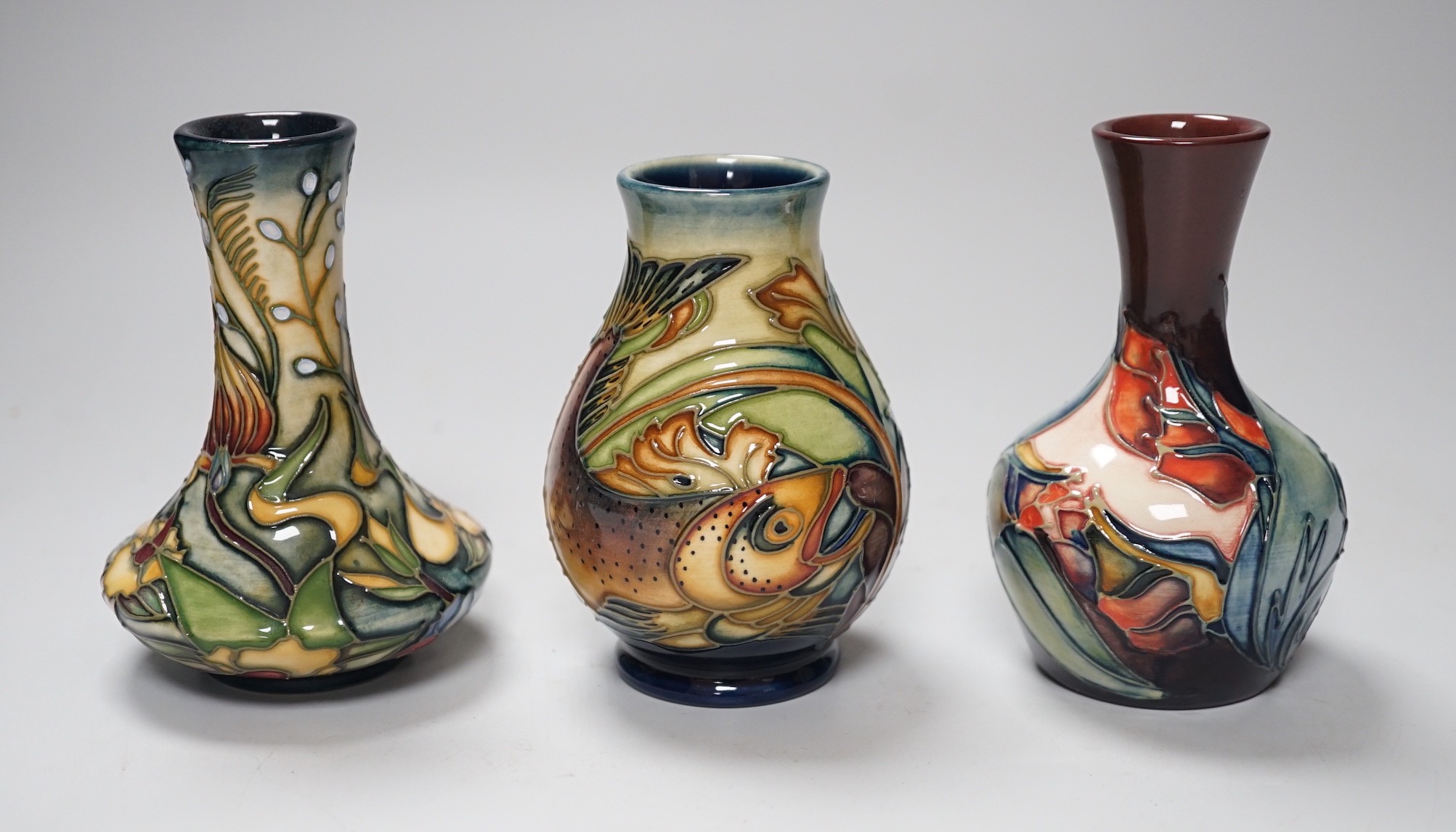 Three boxed Moorcroft vases, tallest 10. 5 cm, Trout, etc.