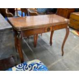 A Regency coromandel banded mahogany folding card table with parcel gilt Egyptianesque metal mounts,